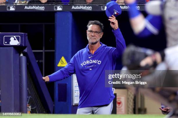 Bench coach Don Mattingly of the Toronto Blue Jays acknowledges the crowd after a tribute video was broadcast of his time as manager of the Miami...