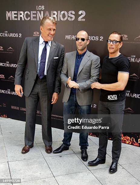 Dolph Lundgren, Jason Statham and Jean-Claude Van Damme attend 'The Expendables 2' photocall at Ritz hotel on August 8, 2012 in Madrid, Spain.