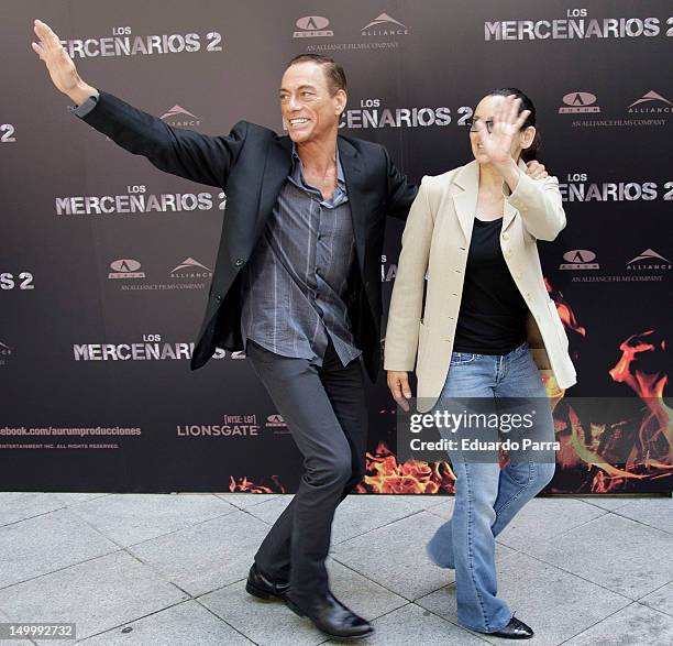 Jean-Claude Van Damme and his wife Gladys Portugues attend 'The Expendables 2' photocall at Ritz hotel on August 8, 2012 in Madrid, Spain.