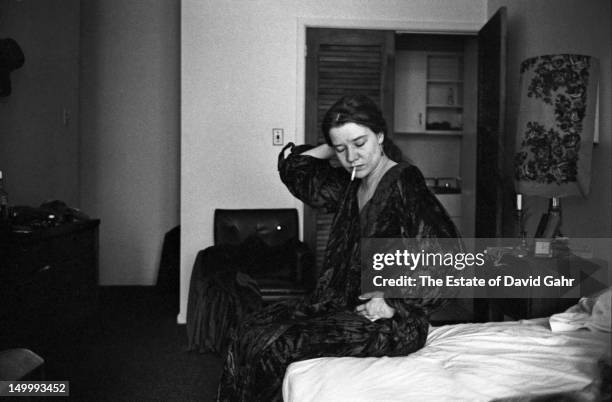 Blues singer Janis Joplin poses for a portrait on March 14, 1969 at the Hotel Chelsea in New York City, New York.