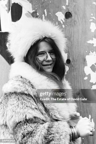 Blues singer Janis Joplin poses for a portrait on March 14, 1969 near her residence at the Hotel Chelsea in New York City, New York.