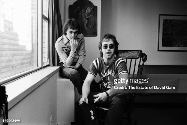 Lyricist Bernie Taupin and singer songwriter Elton John pose for a portrait in November, 1970 in New York City, New York.