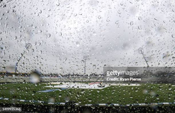 General view as rain falls before the scheduled start of play during Day Five of the LV= Insurance Ashes 1st Test match between England and Australia...