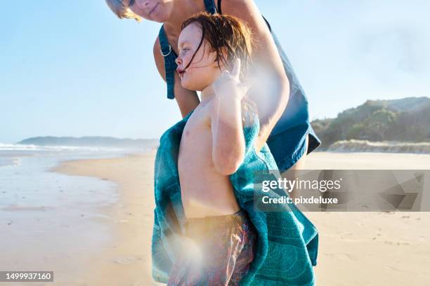 nurturing love: active kids, mother's care, and unforgettable beach days in australia - drying stock pictures, royalty-free photos & images