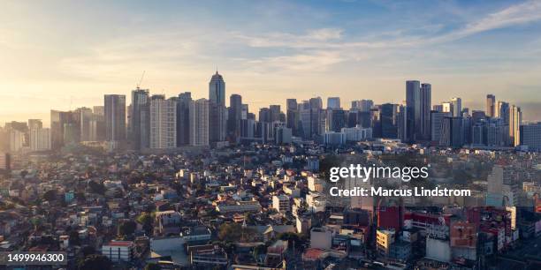 skyline of bonifacio global city in taguig, metro manila - filipijnen stockfoto's en -beelden