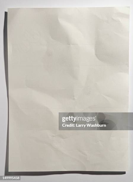 a crumpled sheet of paper - crumpled stock-fotos und bilder