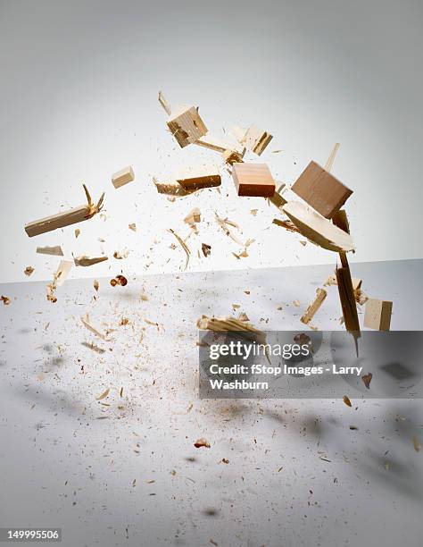 wood exploding into pieces - zerbrechen stock-fotos und bilder