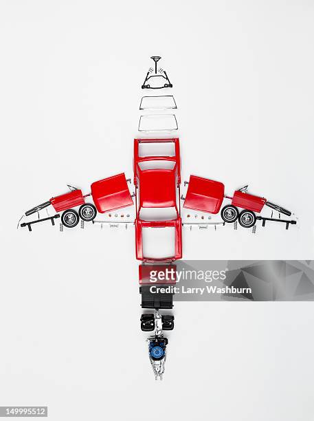 parts of a model car arranged in the form of an airplane - airplane part fotografías e imágenes de stock