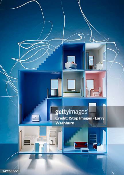 the inside of a dollhouse with light trails behind it - dollhouse stockfoto's en -beelden