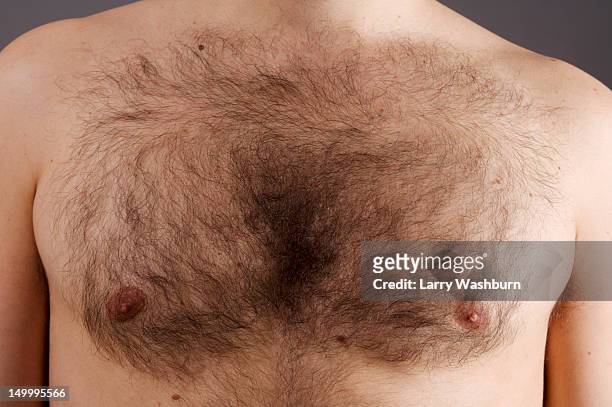 detail of the chest of a man - chest torso stockfoto's en -beelden