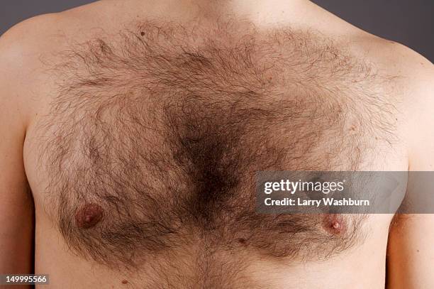 detail of the chest of a man - male torso stock pictures, royalty-free photos & images