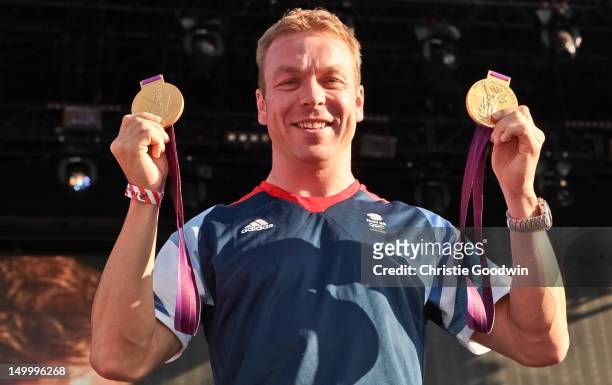 Sir Chris Hoy who won gold in the team sprint and the keirin at the London 2012 Olympics greets the crowd during BT London Live at Hyde Park on...
