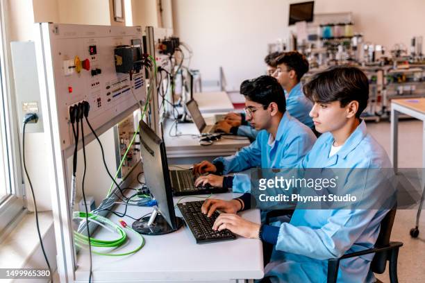 technical vocational training - engeneer student electronics stock pictures, royalty-free photos & images