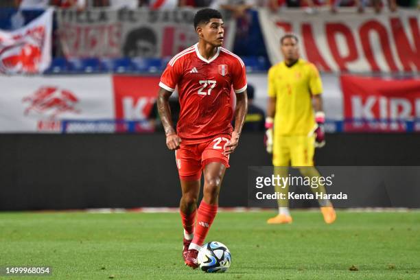 Wilder Cartagena of Peru in action during the international friendly match between Japan and Peru at Panasonic Stadium Suita on June 20, 2023 in...
