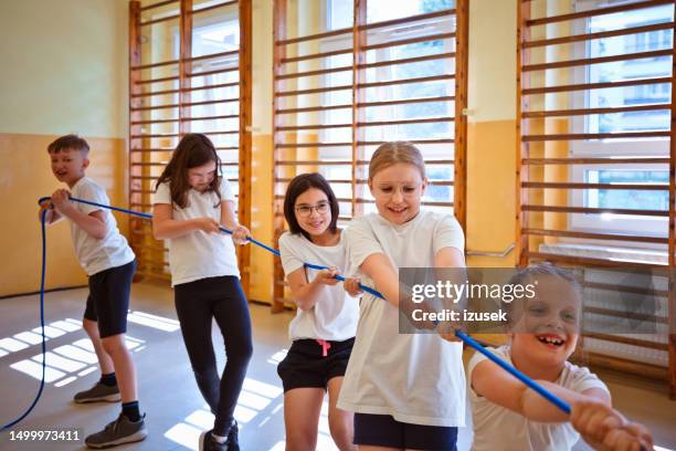 A Group Of School Kids In A Tugofwar Game, 照片檔