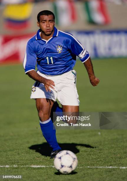 Romário, Forward for the Brazil Men's National Soccer Team in motion with the ball during the 1998 CONCACAF Gold Cup 3rd Place match against Jamaica...