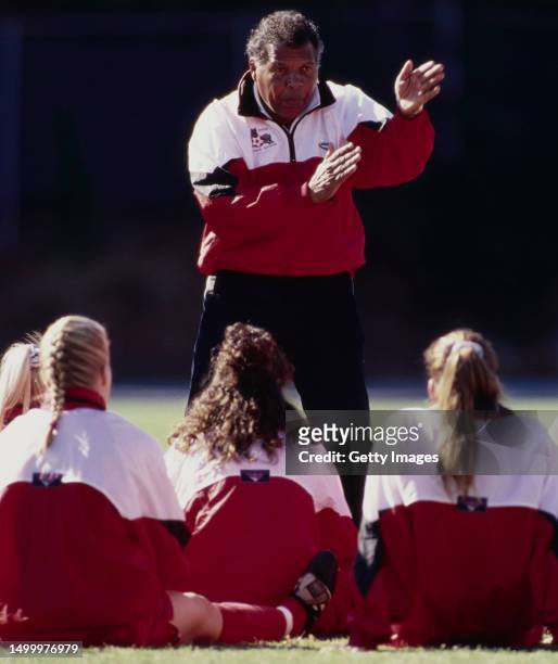 Alvin Corneal from Trinidad and Tobago, Head Coach for the NCAA Division I North Carolina State Wolfpack Women's Soccer Team gives instructions to...