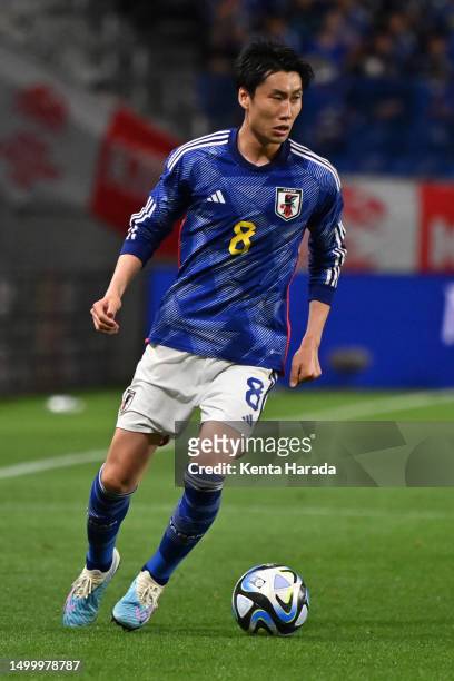 Daichi Kamada of Japan in action during the international friendly match between Japan and Peru at Panasonic Stadium Suita on June 20, 2023 in Suita,...