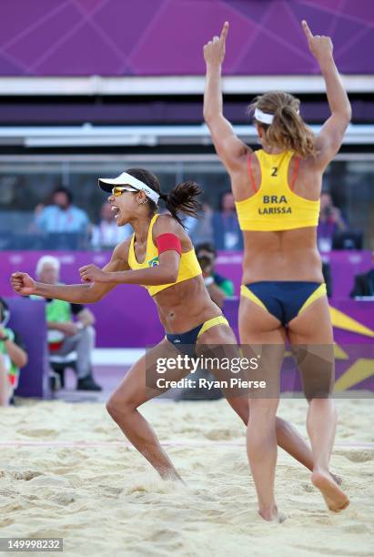 Juliana Silva and Larissa Franca of Brazil celebrate during the Women's Beach Volleyball Bronze medal match against China on Day 12 of the London...