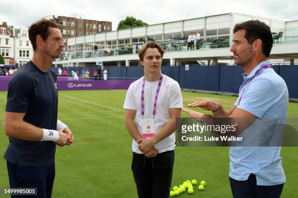Andy Murray of Great Britain speaks with Oscar Piastri, McLaren Formula 1 driver and Mark Webber, former Formula 1 driver on Day Two of the cinch...
