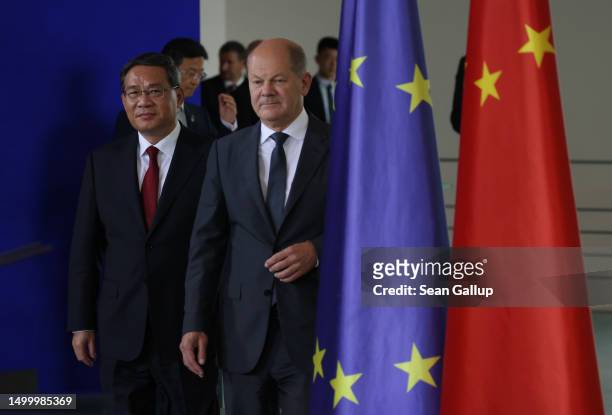 Chinese Premier Li Qiang and German Chancellor Olaf Scholz arrive to speak to the media at the Chancellery on June 20, 2023 in Berlin, Germany. The...