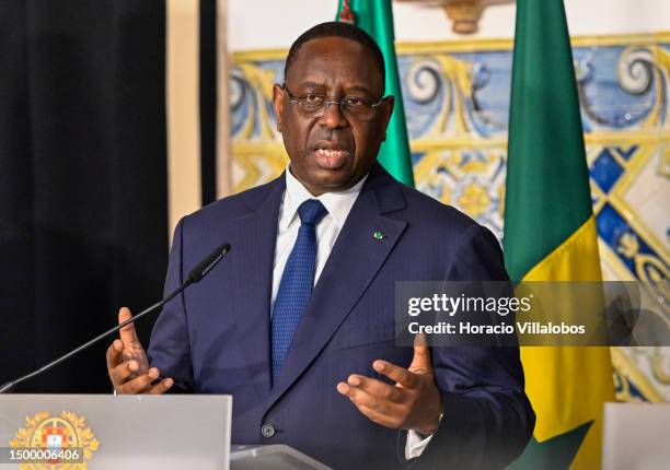 The President of the Republic of Senegal Macky Sall gestures as he delivers a closing statement to the press after his one-on-one meeting with...