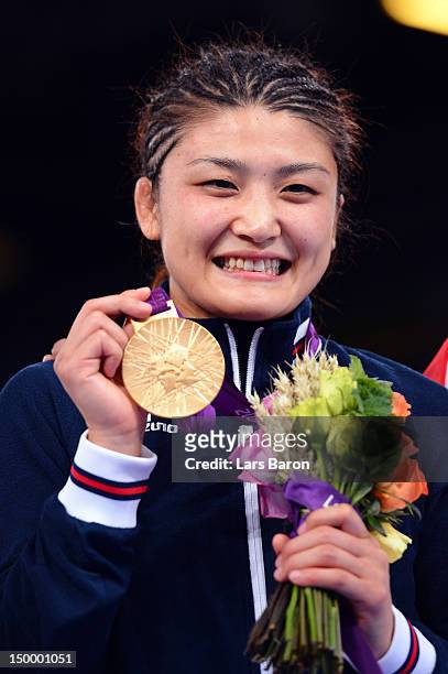 Kaori Icho of Japan celebrates winning the gold medal in the Women's Freestyle 63 kg Wrestling on Day 12 of the London 2012 Olympic Games at ExCeL on...