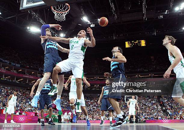 Alex Garcia of Brazil goes up for a shot against Andres Nocioni of Argentina in the first half during the Men's Basketball quaterfinal game on Day 12...