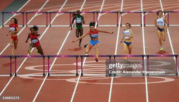 Natalya Antyukh of Russia and Lashinda Demus of the United States lead the field in the Women's 400m Hurdles Final on Day 12 of the London 2012...