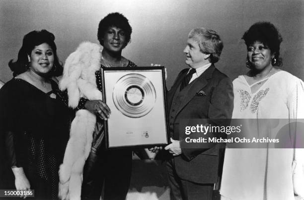 Disco singer Sylvester aka Sylvester James presents a gold 'Step II' album to Merv Griffin during his latest appearance on Griffin's TV talk show...