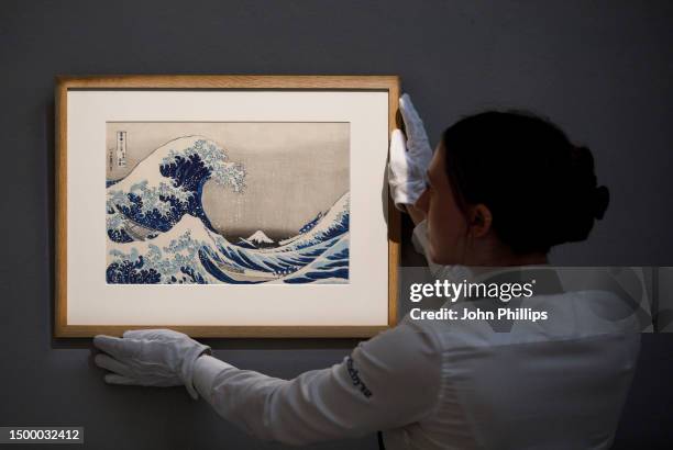 Work by artist Katsushika Hokusai tilted The Great Wave on display ahead of the Sotheby's summer sales of Modern & Contemporary Art at Sotheby's on...