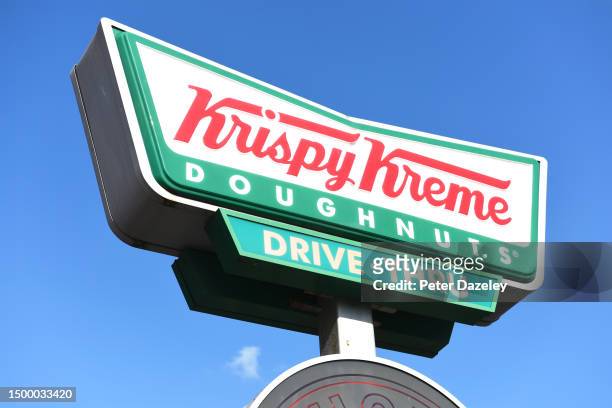 June 2023: Krispy Kreme Doughnuts store sign External Store Sign London, England.