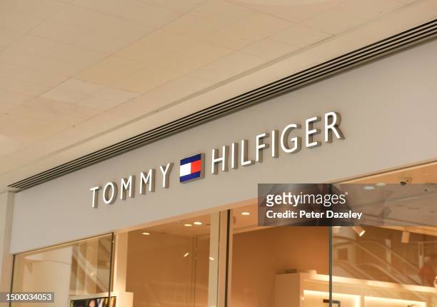 June 2023: Tommy Hilfiger store sign External Store Sign London, England.