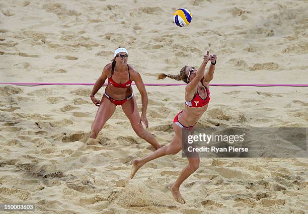 Kerri Walsh Jennings of the United States jumps for the ball during the Women's Beach Volleyball Gold medal match against the United States on Day 12...