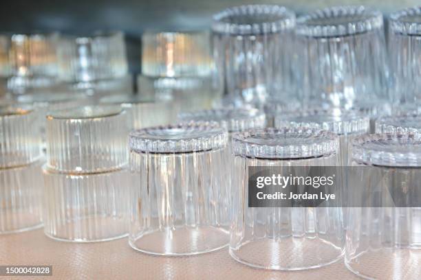 glass upside down on a rack - empty glass stock pictures, royalty-free photos & images