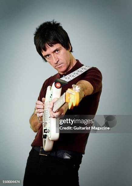 English guitarist and songwriter Johnny Marr, best know as the guitarist of English alternative rock band The Smiths, during a portrait shoot for...