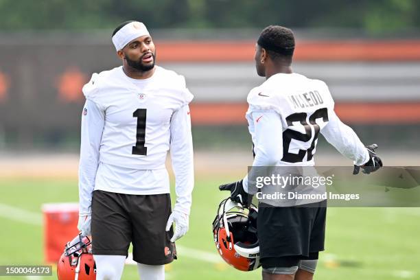 Juan Thornhill of the Cleveland Browns talks with Rodney McLeod Jr. #26 during the Cleveland Browns mandatory veteran minicamp at CrossCountry...