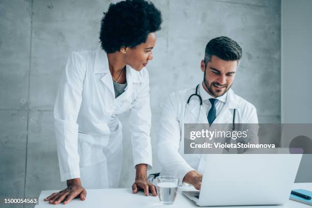 Two Doctors Conversation 532 Doctor Case Study Stock Photos, High-Res Pictures, and Images ...