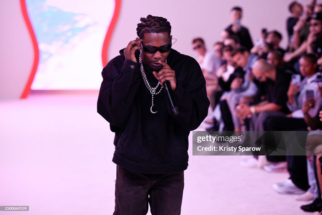 Pmg Rapper Rapper Offset performs on the runway during the Li-Ning Menswear ...