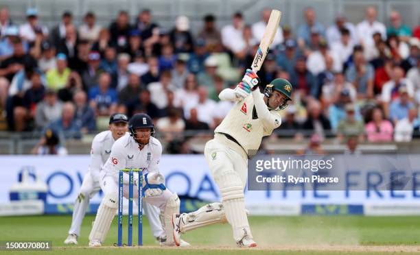 Alex Carey of Australia hits out and is caught and bowled by Joe Root of England during Day Five of the LV= Insurance Ashes 1st Test match between...