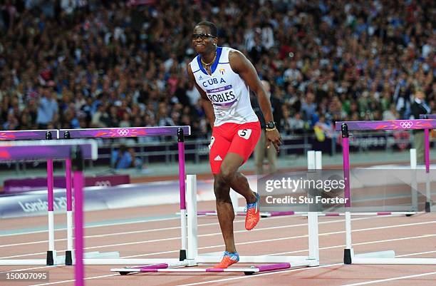 Dayron Robles of Cuba pulls up injured in the Men's 110m Hurdles Final on Day 12 of the London 2012 Olympic Games at Olympic Stadium on August 8,...