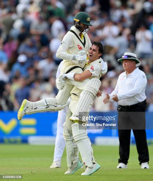 Pat Cummins of Australia celebrates after hitting the winning runs with teammate Nathan Lyon during Day Five of the LV= Insurance Ashes 1st Test...