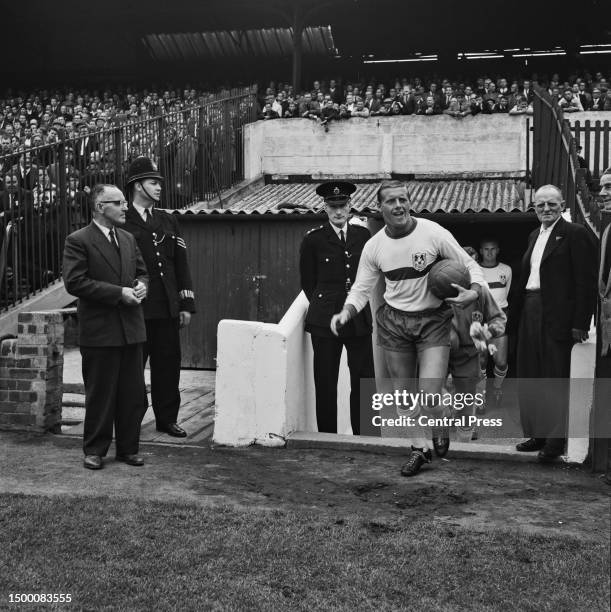 Millwall Football Club captain and defender Harry Cripps leads out his team during a League Division Three match against Barnsley at Oakwell Stadium,...