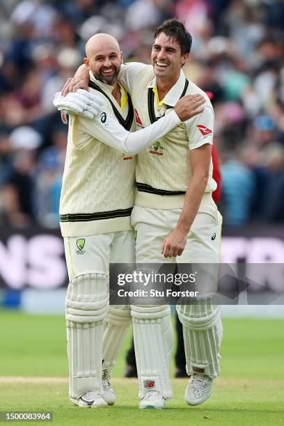 Pat Cummins of Australia celebrates after hitting the winning runs with teammate Nathan Lyon during Day Five of the LV= Insurance Ashes 1st Test...