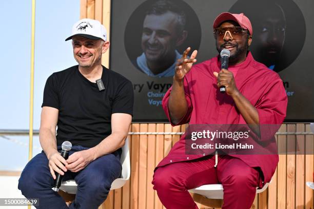 Gary Vaynerchuk and will.i.am speak during the VaynerX Rose Reception on the VaynerX Yacht on June 20, 2023 in Cannes, France.