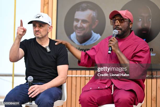 Gary Vaynerchuk and will.i.am speak during the VaynerX Rose Reception on the VaynerX Yacht on June 20, 2023 in Cannes, France.