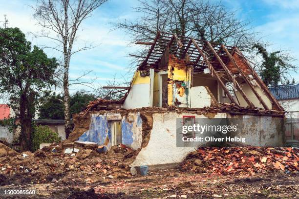 an almost completely destroyed old house - earthquake destruction stock pictures, royalty-free photos & images