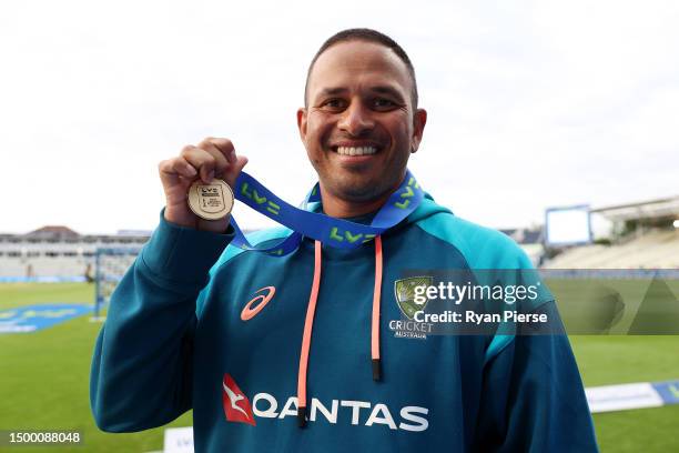 Usman Khawaja of Australia poses for a photograph with the Player of the Match medal after Australia defeat England during Day Five of the LV=...