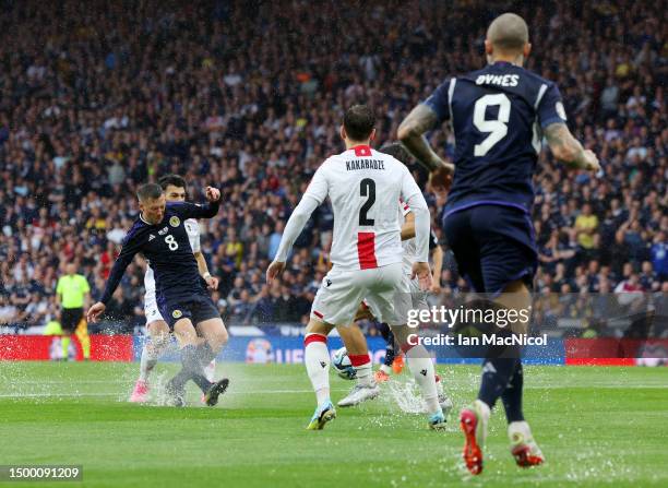 Callum McGregor of Scotland scores the team's first goal during the UEFA EURO 2024 qualifying round group A match between Scotland and Georgia at...