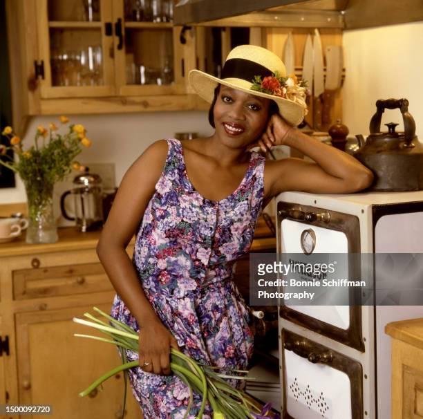 American actress Alfre Woodard smiles and wears a hat in Los Angeles, California, circa 1987.